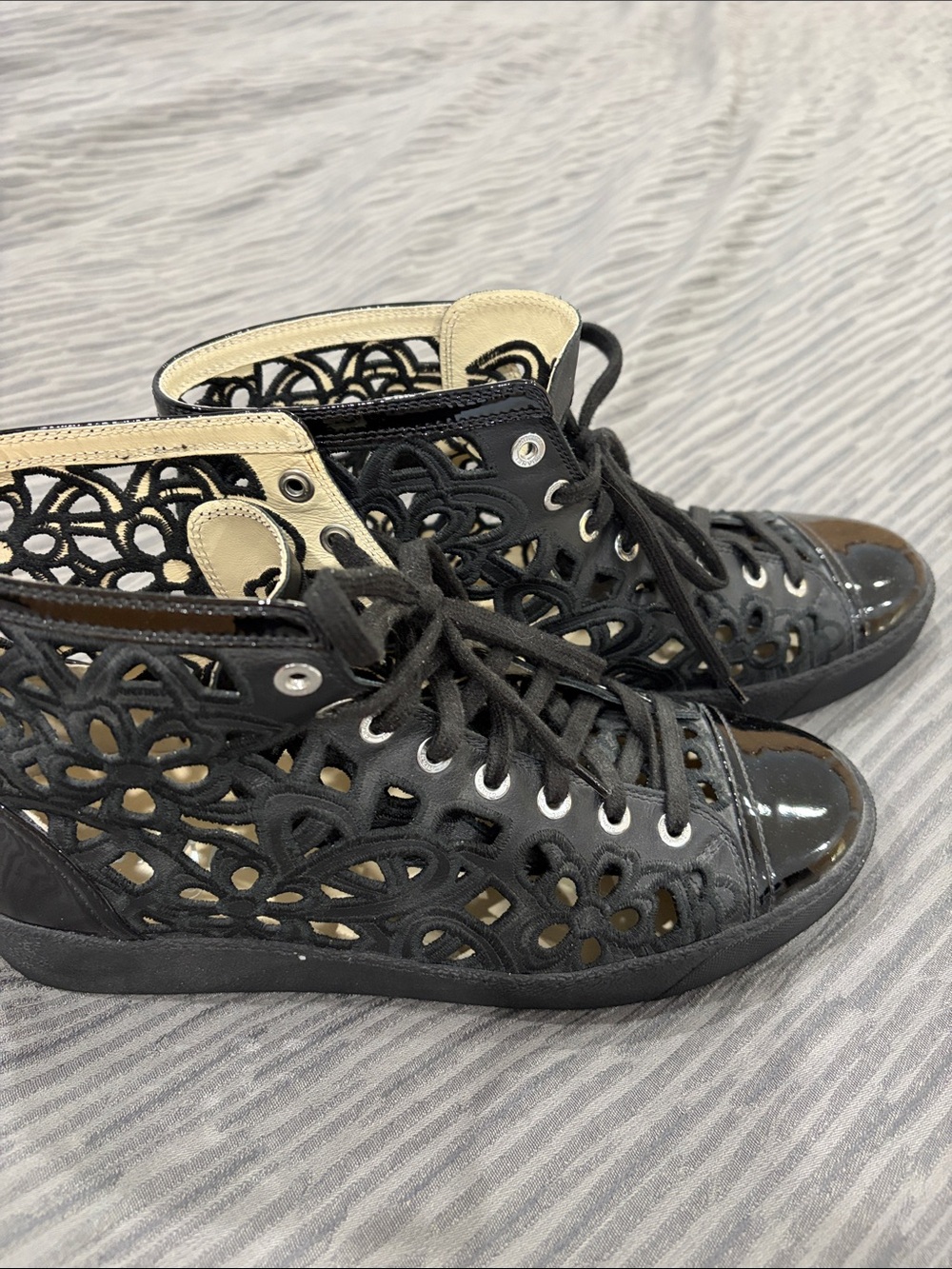 CHANEL Black Laser-Cut Lace-Up High-Top Sneakers with Patent Toe